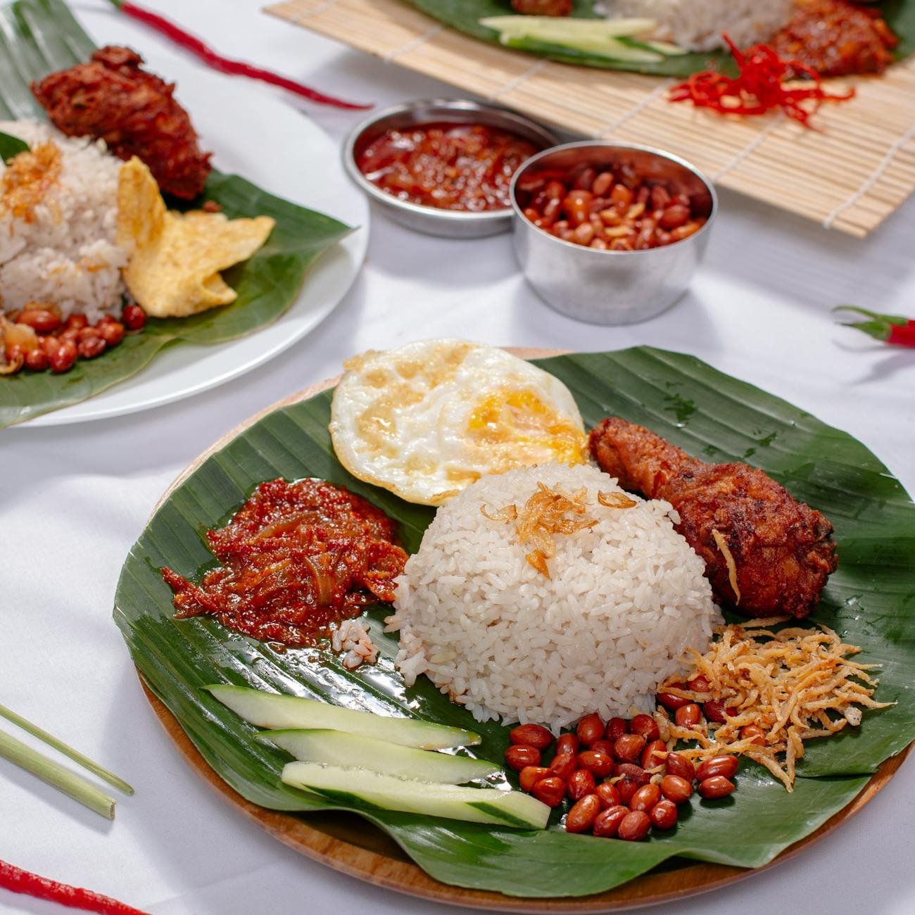 nasi lemak served on banana leaf
